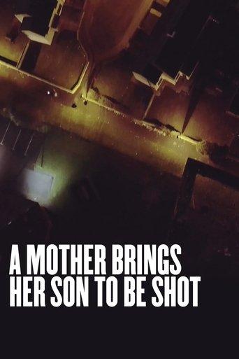 A Mother Brings Her Son to Be Shot image