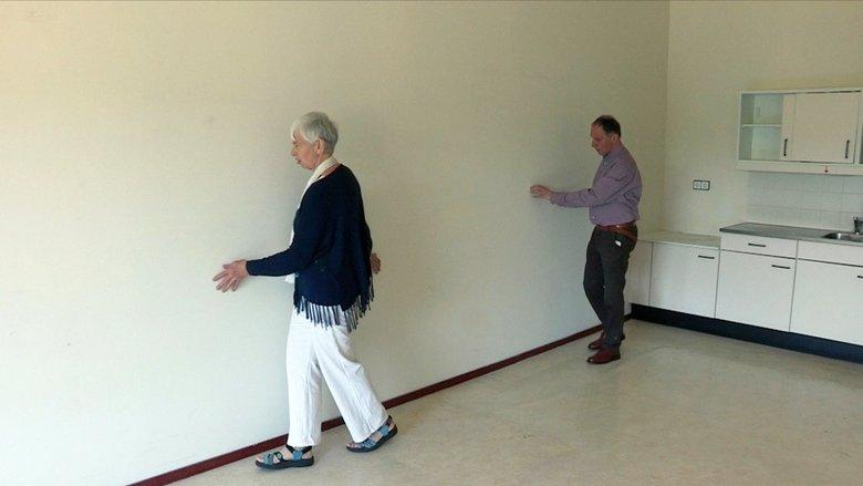 Op de tast image